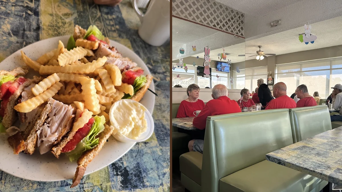 Bright family restaurant dining room with booth seating.