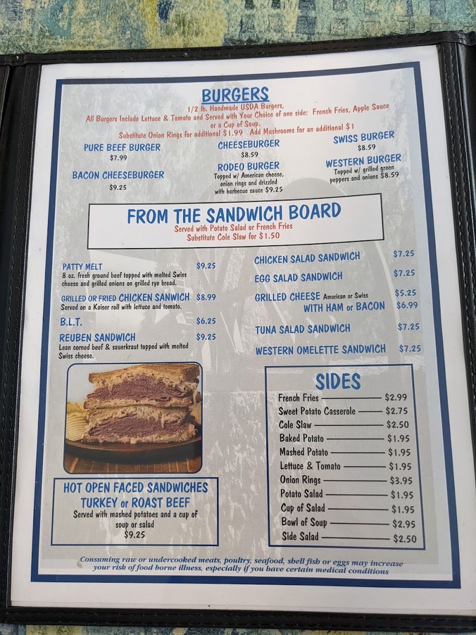 Restaurant menu with classic diner dishes listed.